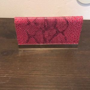 Fake snake skin clutch